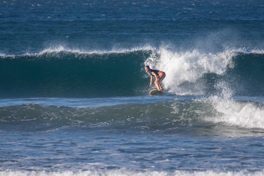 Surfer riding a wave at Playa Garza